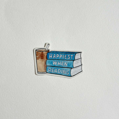 happiest when reading stack of books with a coffee beside it