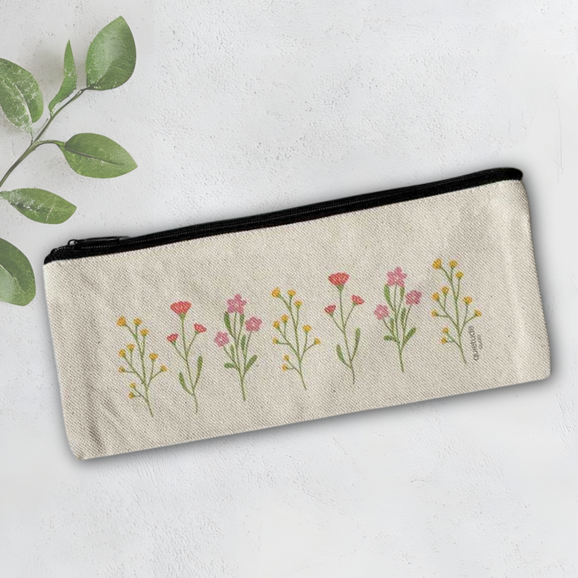 Pencil case with floral designs on a light background
