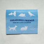 2026 Pet Cloud Calendar titled 'Treasured Friends' with animal silhouettes on a sky background.